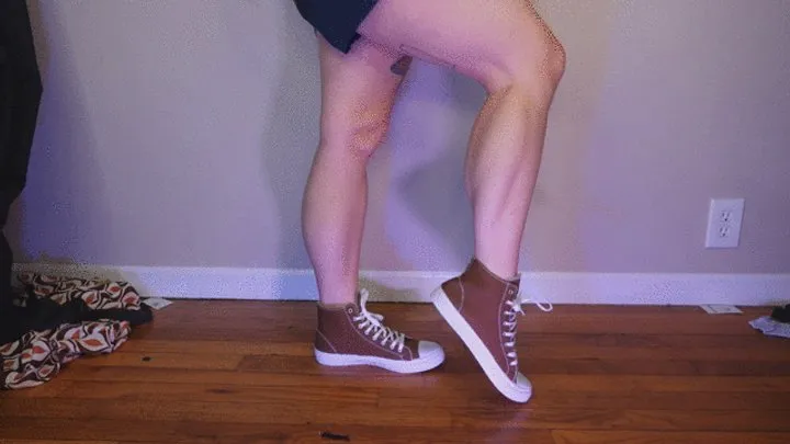 Calf Muscle Flex in Brown High Top Converse Sneakers