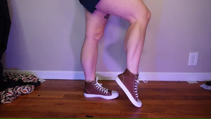 Calf Muscle Flex in Brown High Top Converse Sneakers