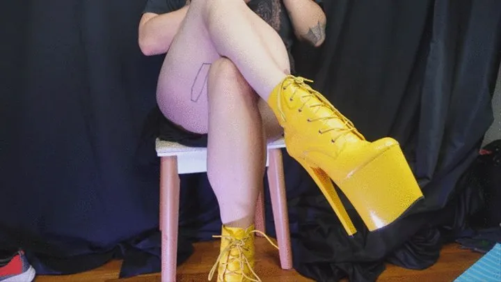 Crossing Legs and Muscular Calves in Big Yellow Boots