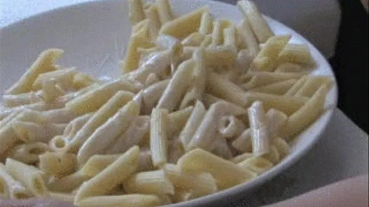 ANGELA HOGS OUT ON A BIG PLATE OF PASTA AND CHIPS