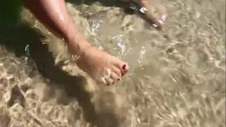 Sexy foot at the beach