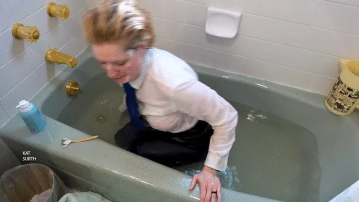 Wearing shirt and tie while shaving my legs in a bathtub