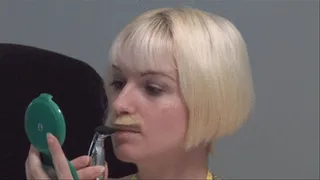 Mustached woman trimming mustache and applying lipstick