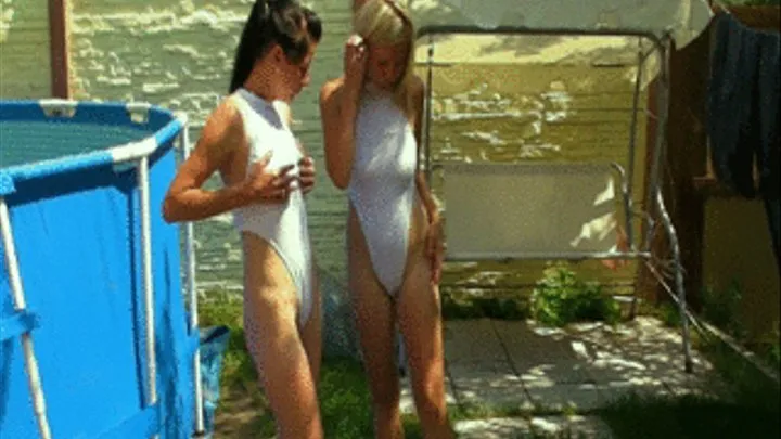 Christina and Nikki in white swimsuit pumping up a mattress