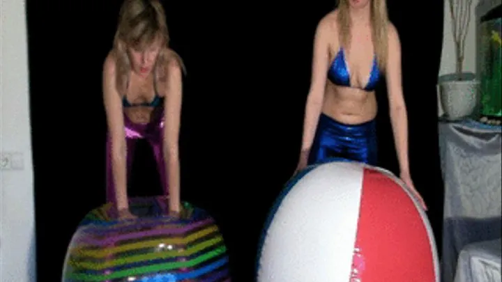 Alina and Christina deflating topless big beachballs