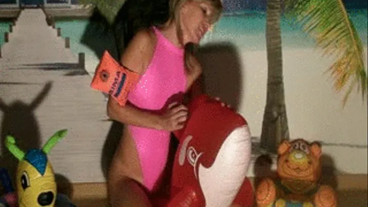 Deflating pooltoys in pink swimsuit