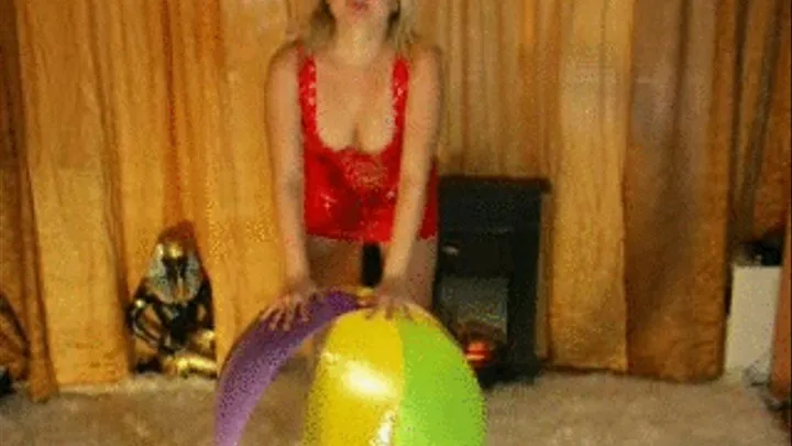 Christina rides a beachball