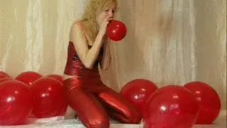 Nikki blow to pop balloons