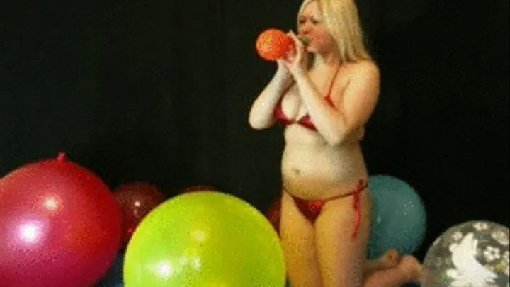 Christina blows up balloons