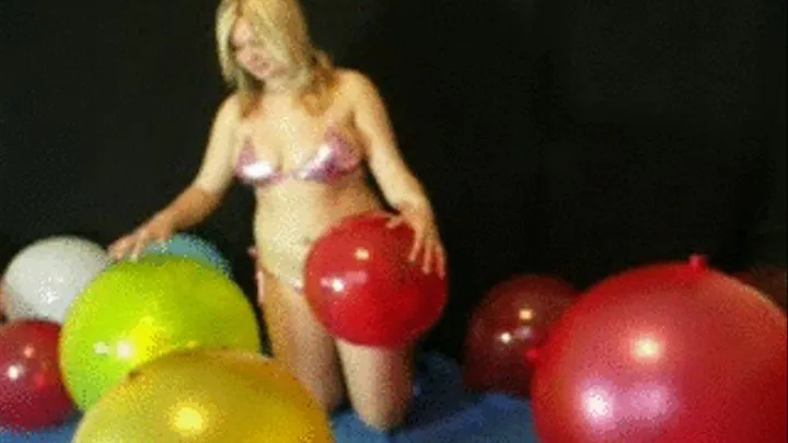 Christina rides and plays with balloons