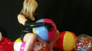 Christina in Spandexdress plays with beachballs