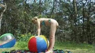 Alina in blue Spandex Bikini plays and deflates Beachball