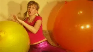 Alina riding on a giant balloon in Spandex 1