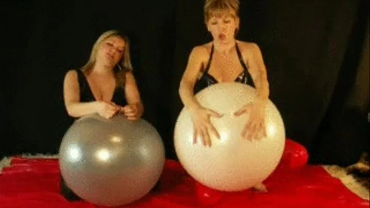 2 Latex-Girls deflating and squeezing big balloons