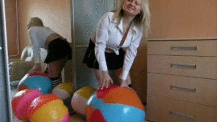 Christina as a Schoolgirl plays with beachballs