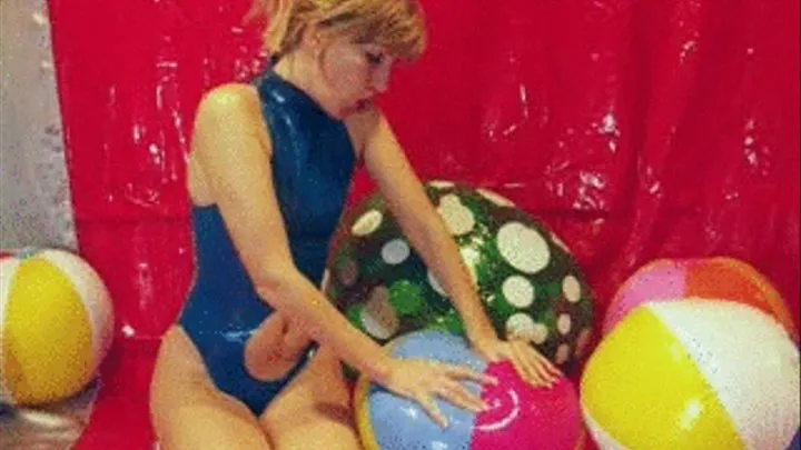 Alina riding beachball with loveballs inside