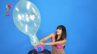 Emiko Debuts Machine Popping Halloween Balloons