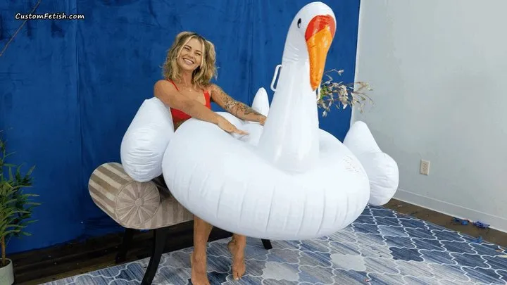 Madi B Inflates a Swan by Mouth