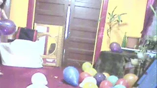 Tiny Sunny Tries to sit on these balloons and pop them one by one.