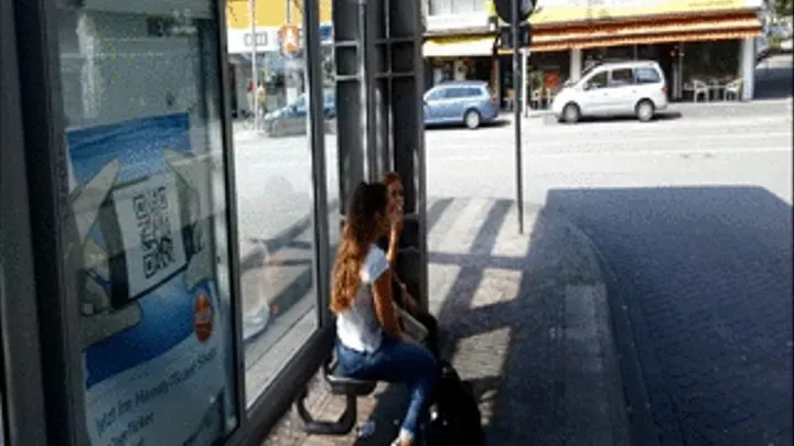 Candid German Sneakers Lady Smoking At Bus Station