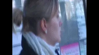 Nice sneakers lady sitting at the bus stop