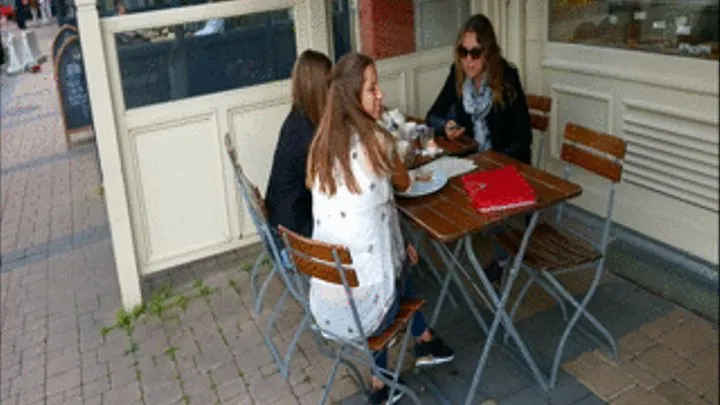 3 Belgian Ladies in front of a Bakery