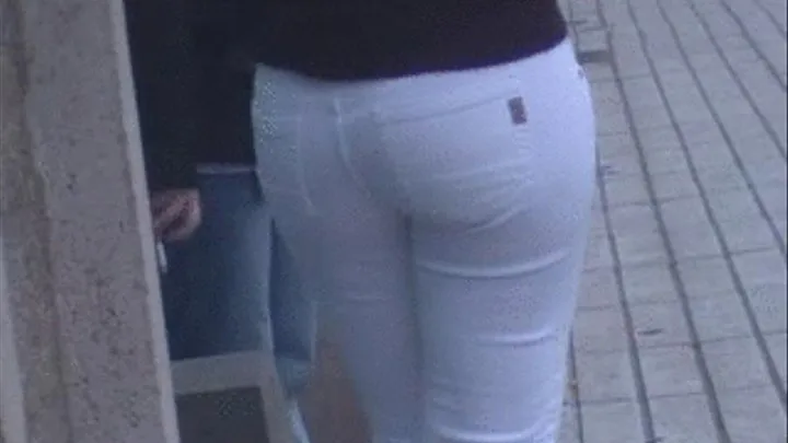 White jeans ass lady smoking in the street