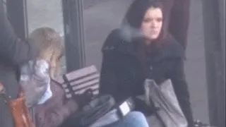 German smoking boots girls while snow falls