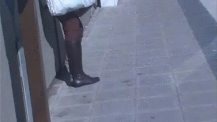 Brown Boots Lady at the tramway station