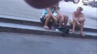 3 smoking and spitting girls on a hot day in summer in France