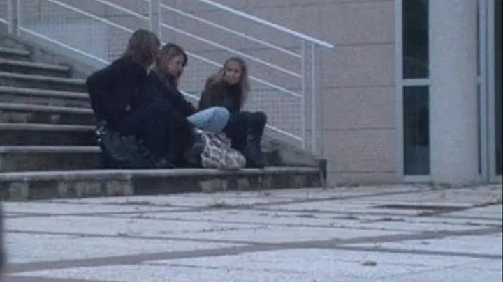 3 beauty students chatting on stairs