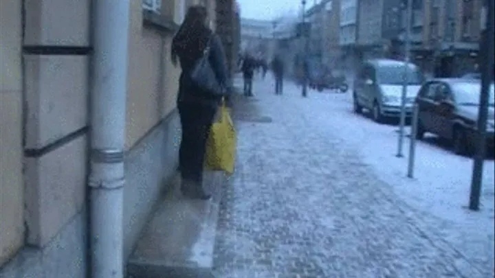 Black Boots Waiting In The Snow