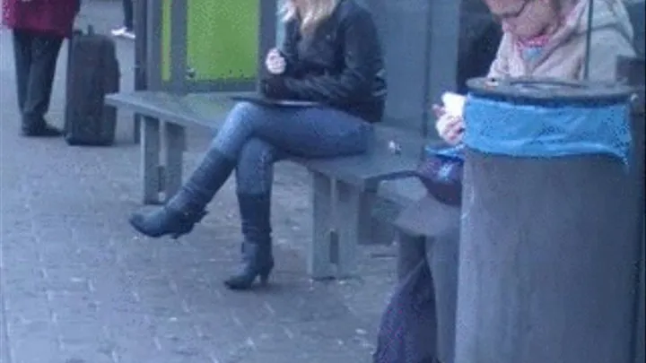 Shy blond girl in nice boots