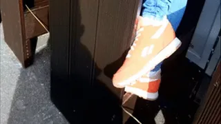 Orange Sneakers Almost Kissed