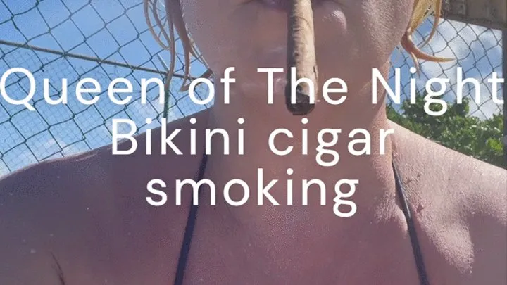 Cigar smoking in bikini