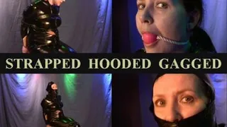 STRAPPED HOODED GAGGED