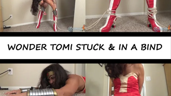 WONDER TOMI STUCK AND IN A BIND