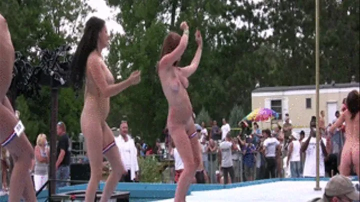 outdoor party with strippers dancing on poles