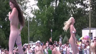 group of naked girls on stage dance off at day festival