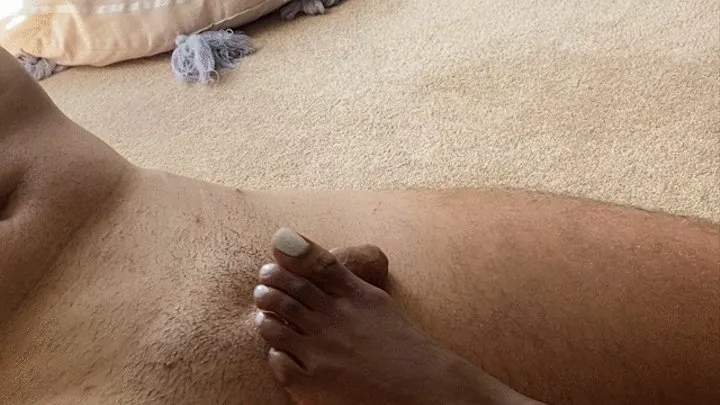 Rubbing beautiful Ebony feet all over white cock