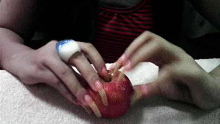 peeling, sccratching and digging apple.