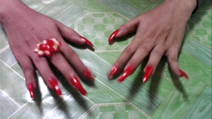 tapping red nails