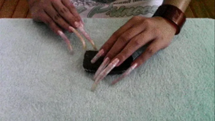 long nails playing cake!