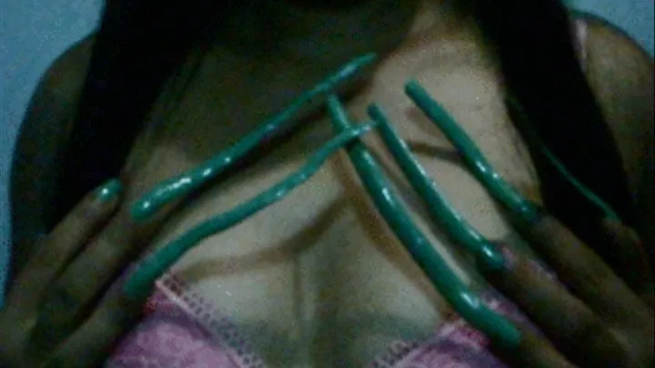 long green nails on breast and nipples...