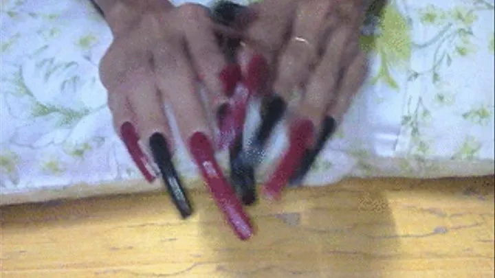 Red and Black longnails close up