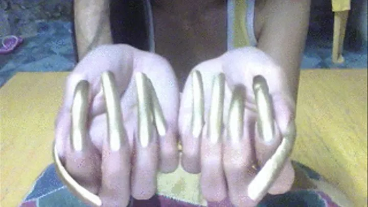 Golden nails open ad close palm