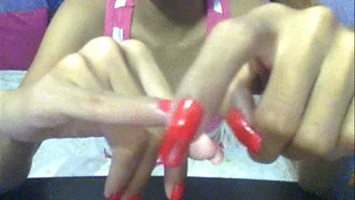 Neon red nails caressing