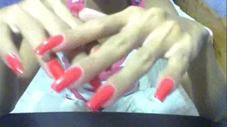 Neon red nails close up