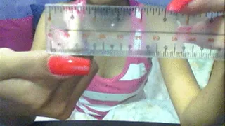 Neon red nails measuring