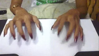 Square maroon nails tapping